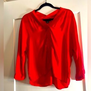 Red silk blouse